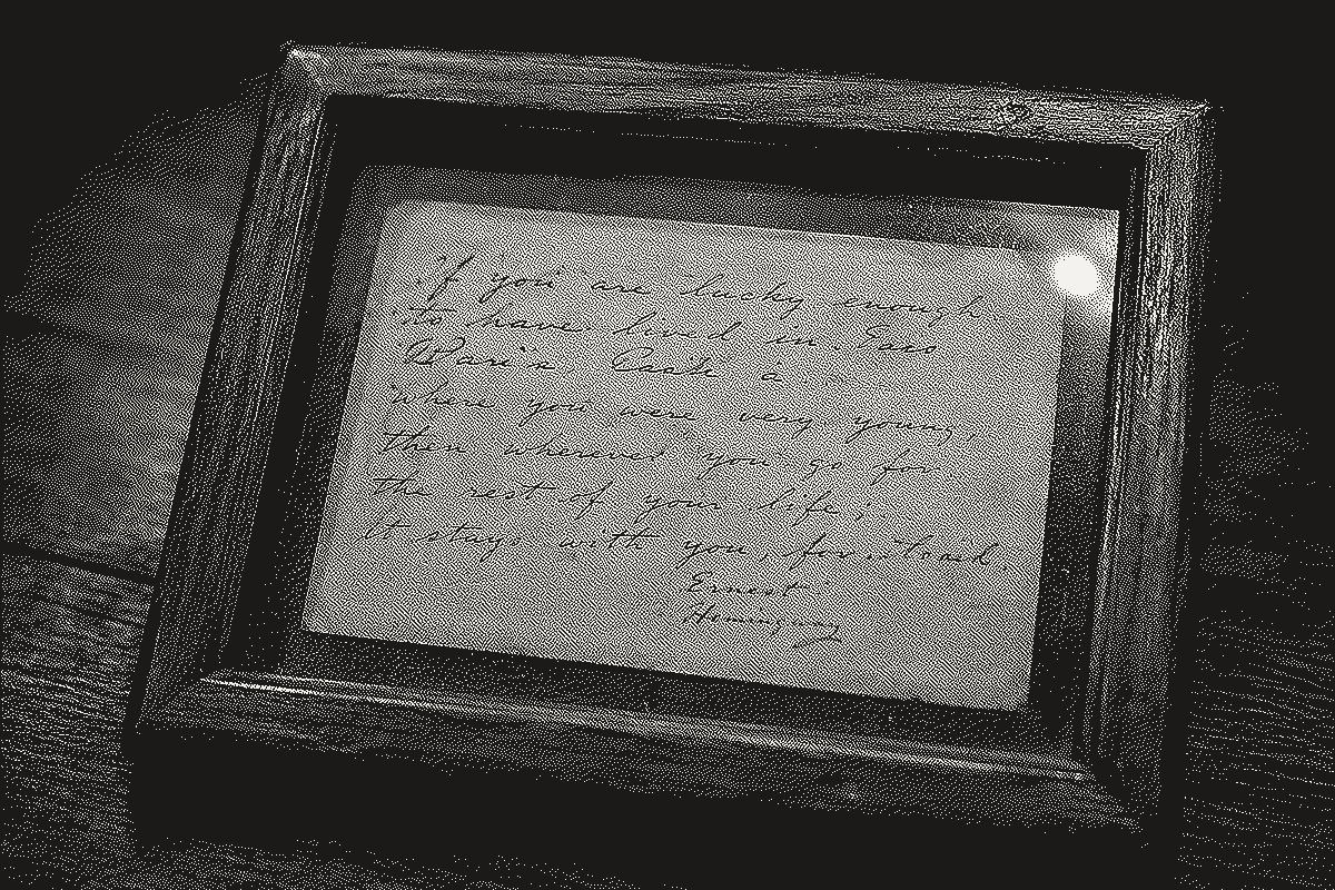 A framed, handwritten note signed Ernest Hemingway