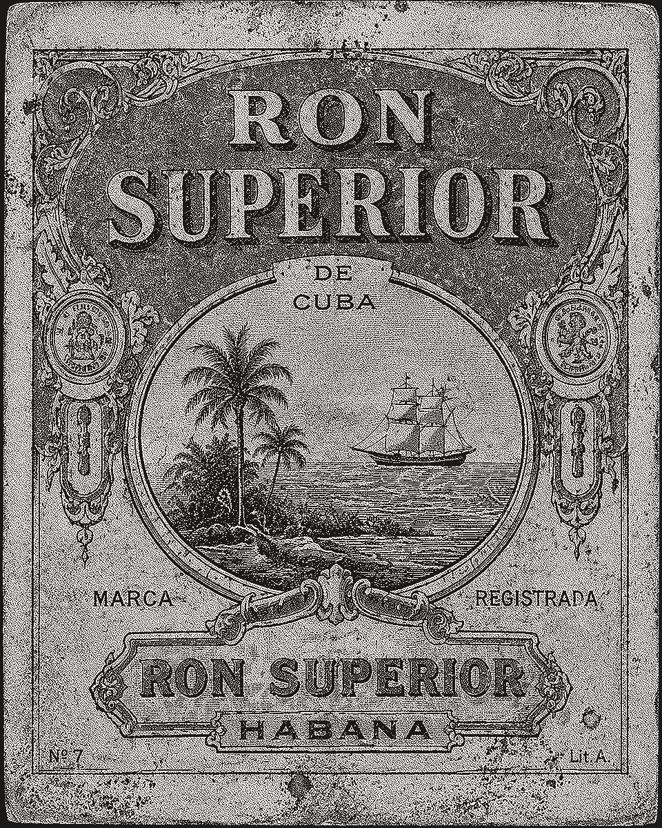 A bottle of Ron Superior Cuban rum, its label aged and stained